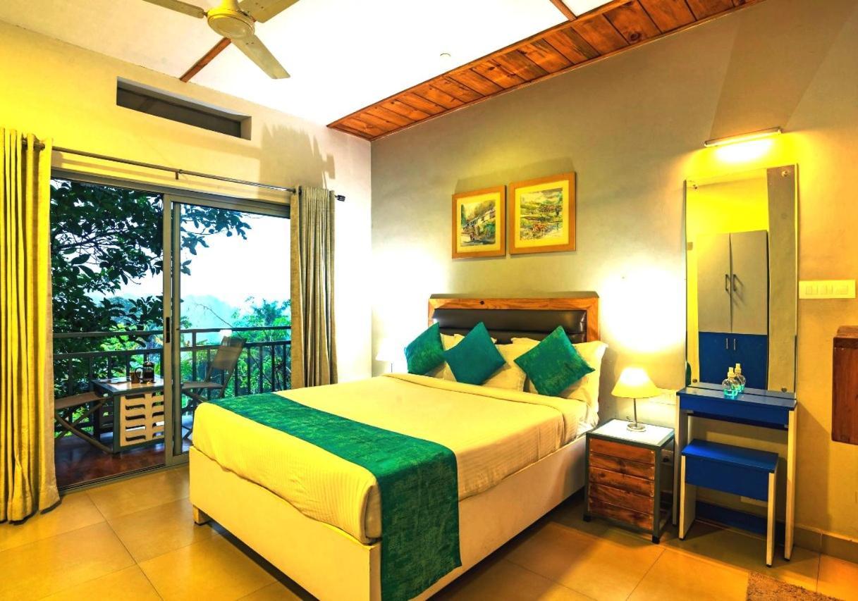 Mistletoe Homestay & Cafe Муннар Екстер'єр фото